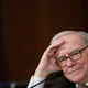 Berkshire Hathaway Chairman and CEO Warren Buffett listens during a hearing before the Senate Finance Committee on November 14, 2007, on Capitol Hill in Washington, DC.